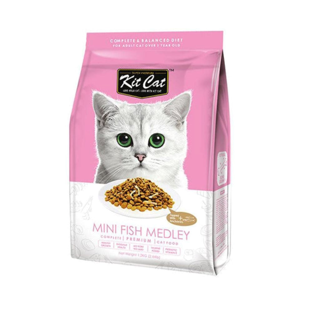 كت كات طعام جاف للقطط مزيج السمك الصغير لنمو العظام الأمثل